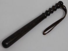 A vintage police truncheon, 15.5in long