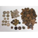 A quantity of copper coinage twinned with a small