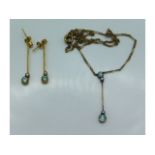 A 14ct gold necklace & earring set with pearl & aq