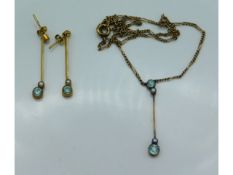A 14ct gold necklace & earring set with pearl & aq