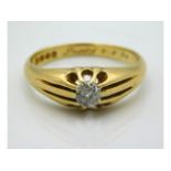 An 18ct Romany style gold ring set with diamond of