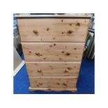 A modern pine chest of four drawers, 31.5in wide x