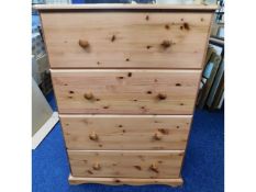 A modern pine chest of four drawers, 31.5in wide x