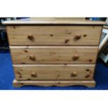 A modern pine chest of three drawers, 31.5in wide