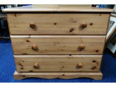 A modern pine chest of three drawers, 31.5in wide