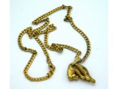 An 8ct gold chain with lion pendant, 19.5in long chain, 17.7g
