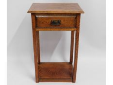 An oak hall table with drawer, 26in tall