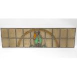 A stained glass leaded window with Mitre decor, 59