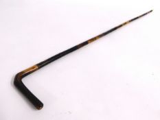 An early 20thC. segmented horn walking cane, 34.75