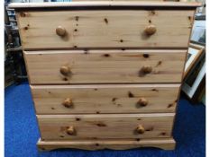 A modern pine chest of four drawers, 31.5in wide x