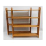 A pair of open pine bookshelves, 40.75in wide x 47