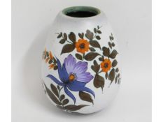 A large Gouda vase with floral decor, 11in high