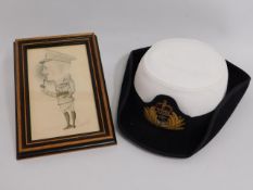 A Wren's naval hat twinned with a caricature sketc