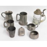 A late Victorian pewter beaker with relief decor &