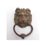 A bronze lion head door knocker, 7.5in high inclus