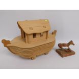 Wooden puzzle of Noah's Ark twinned with carved Bo