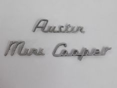 An Austin Mini Cooper rear badge