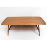 An elm Ercol coffee table, 40in wide x 18in deep x