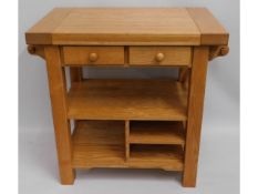 A compact, oak butchers block with drawers, 38.5in