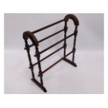 A varnished towel rail