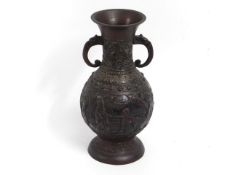 A Chinese relief bronze style vase with figures &