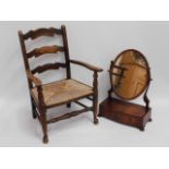 An oak low level rush seated ladder back chair, 31