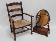 An oak low level rush seated ladder back chair, 31