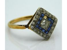 A c.1920's art deco 18ct gold ring (electronically