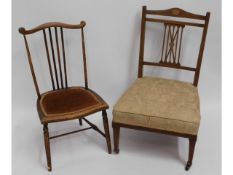A small, elegant mahogany child's bedroom chair