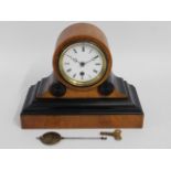 A decorative mantle clock, 10.5in wide x 8.25in hi