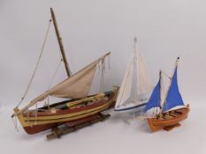 Three model yachts, tallest 24in