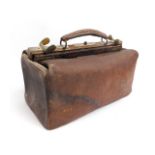 A leather Gladstone bag, 14.5in wide