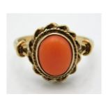 A 9ct gold coral ring, 4.1g, size O