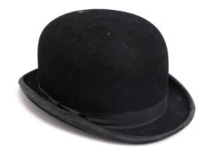 A Moss Bros. Covent Garden, bowler hat