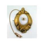 A 19thC. 9ct gold brooch set with chalcedony & cab