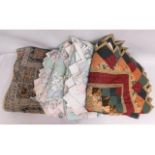 Four vintage bedspreads, three of patchwork style