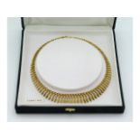 A 9ct gold necklace, 16in long, 19.3g