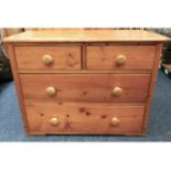 An antique pine chest of four drawers, 35.5in wide