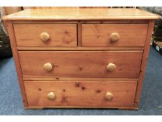 An antique pine chest of four drawers, 35.5in wide