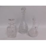 Two cut glass decanters & one water jug with stopp