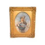 A gilt framed 19thC. watercolour of boy with hurdy