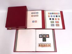 Three albums of mostly British mint stamps, dating