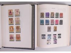 An album of mint stamps including Vatican & Saints