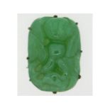 A 19thC. Chinese jade brooch with carved bat decor