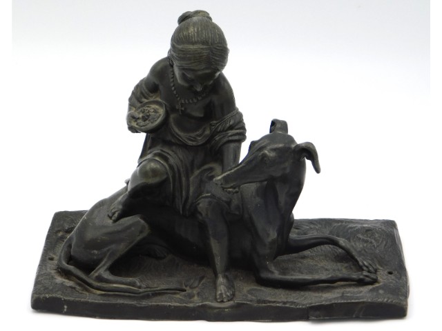 A 19thC. spelter figure group of child & sight hou