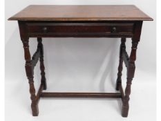An early 20thC. oak hall table with drawer, 33in w