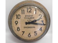A large electric factory clock 'Ernest Chalmer Ltd