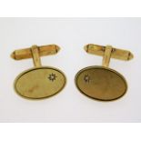 A pair of 9ct gold cuff links set with small diamond, 19mm x 12.5mm, 5.75g