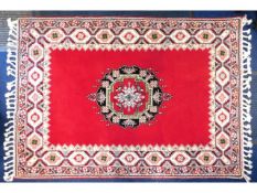 A Moroccan wool rug, 88.5in x 55.25in inclusive of fringe