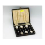 A cased 1937 Sheffield silver set of coffee bean s